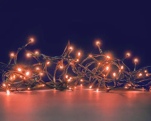 Guirlande lumineuse connectable x2 à 240 LED cuivre sur câble vert Flicker Light® - 20 m